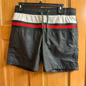 Gucci Black and Red Board Shorts with Modern Design